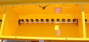 The tank agitator in the seed box, that turns as the drill meter turns helping with seeding of larger seeds like brome.